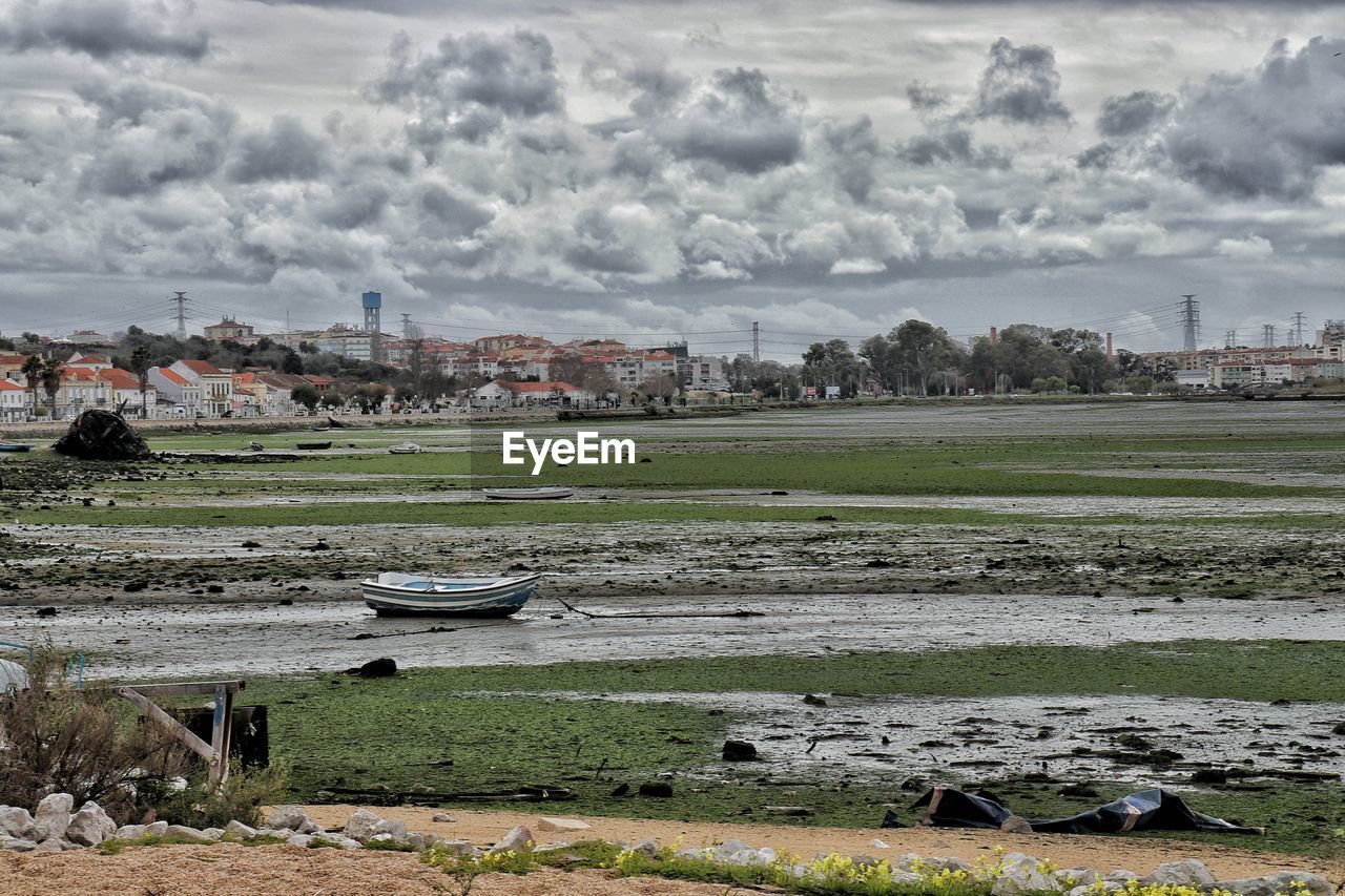 SCENIC VIEW OF BOATS AGAINST SKY