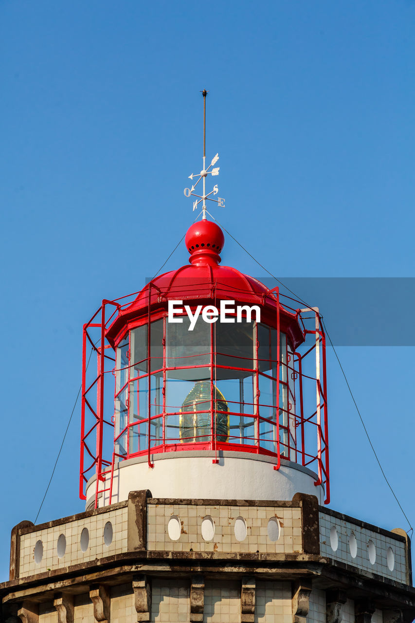 Low angle view of lighthouse against clear sky