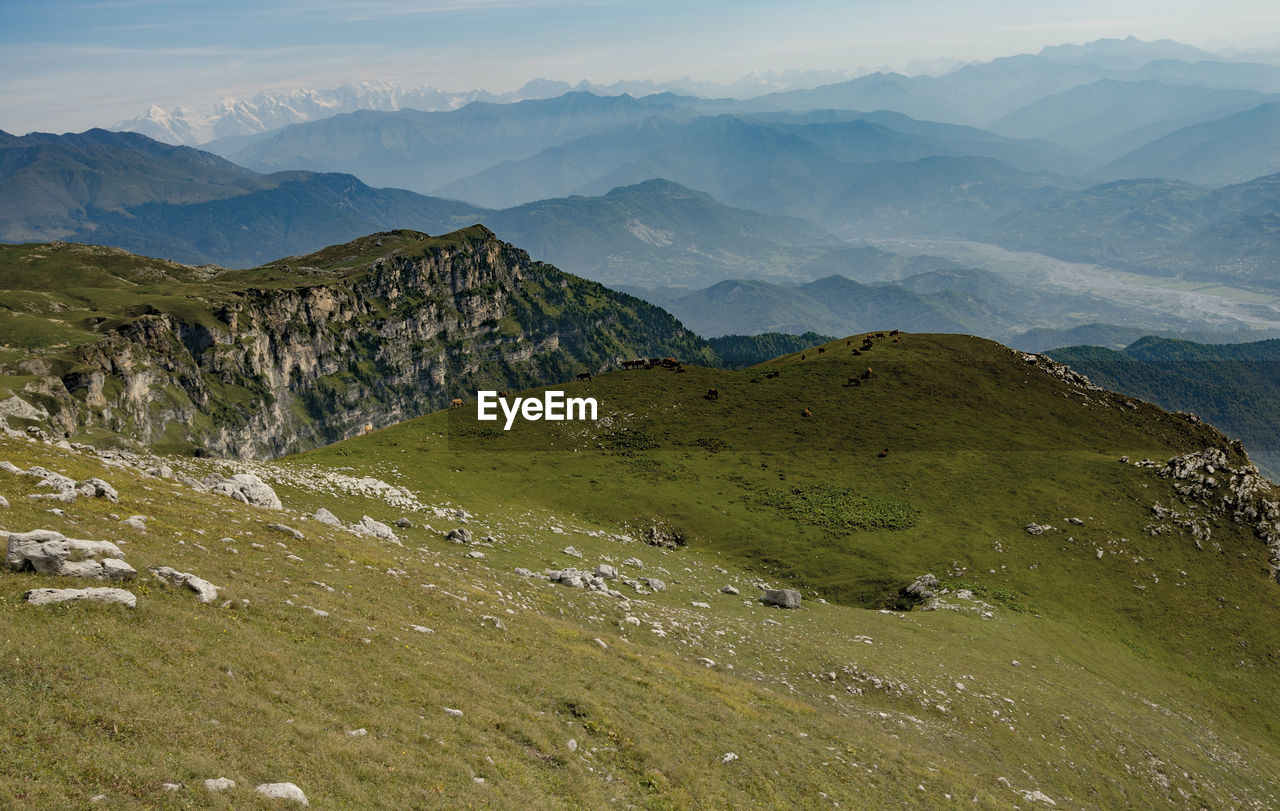 Panoramic view of landscape and mountains against sky