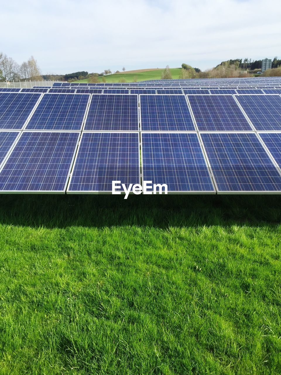 Solar panel on grassy field