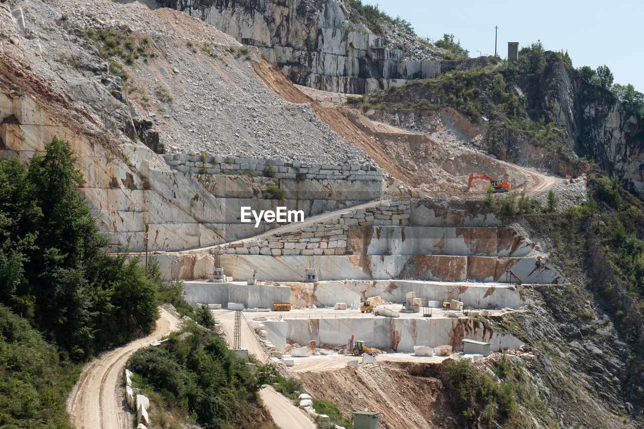 View of the carrara marble quarries with excavation equipment ready for work.