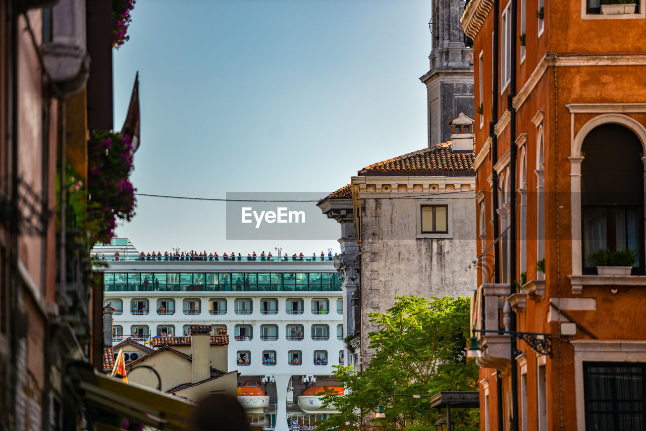 Buildings in city against sky