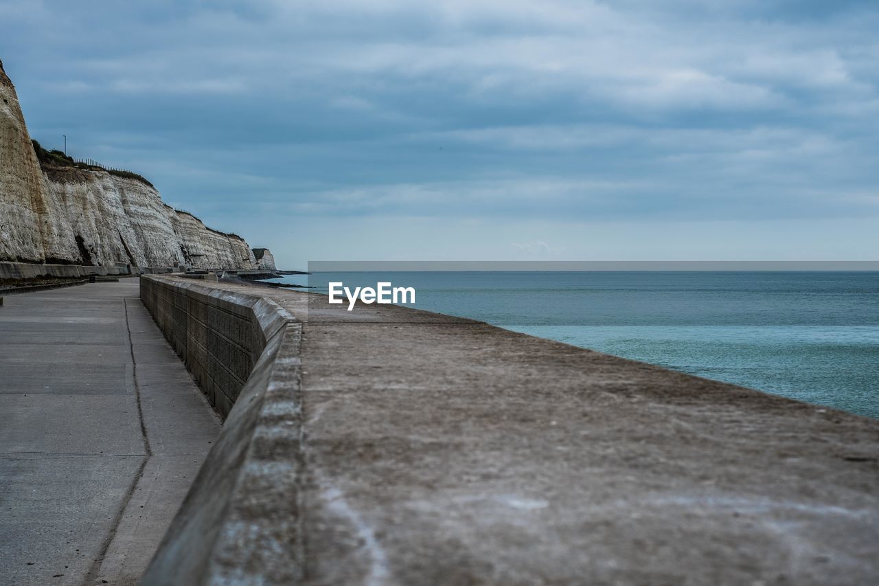 VIEW OF BEACH AGAINST SKY