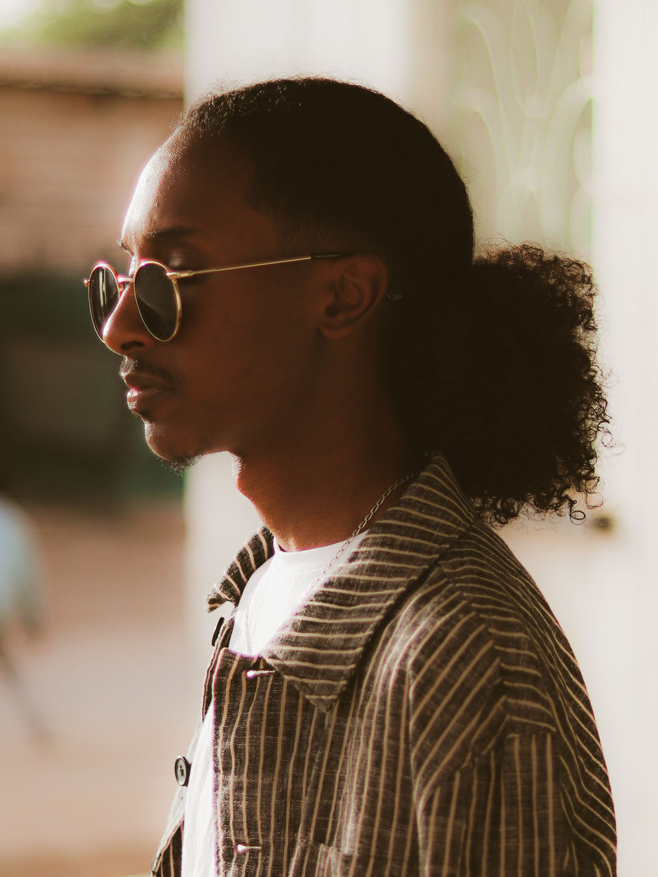 Side view of young man looking away