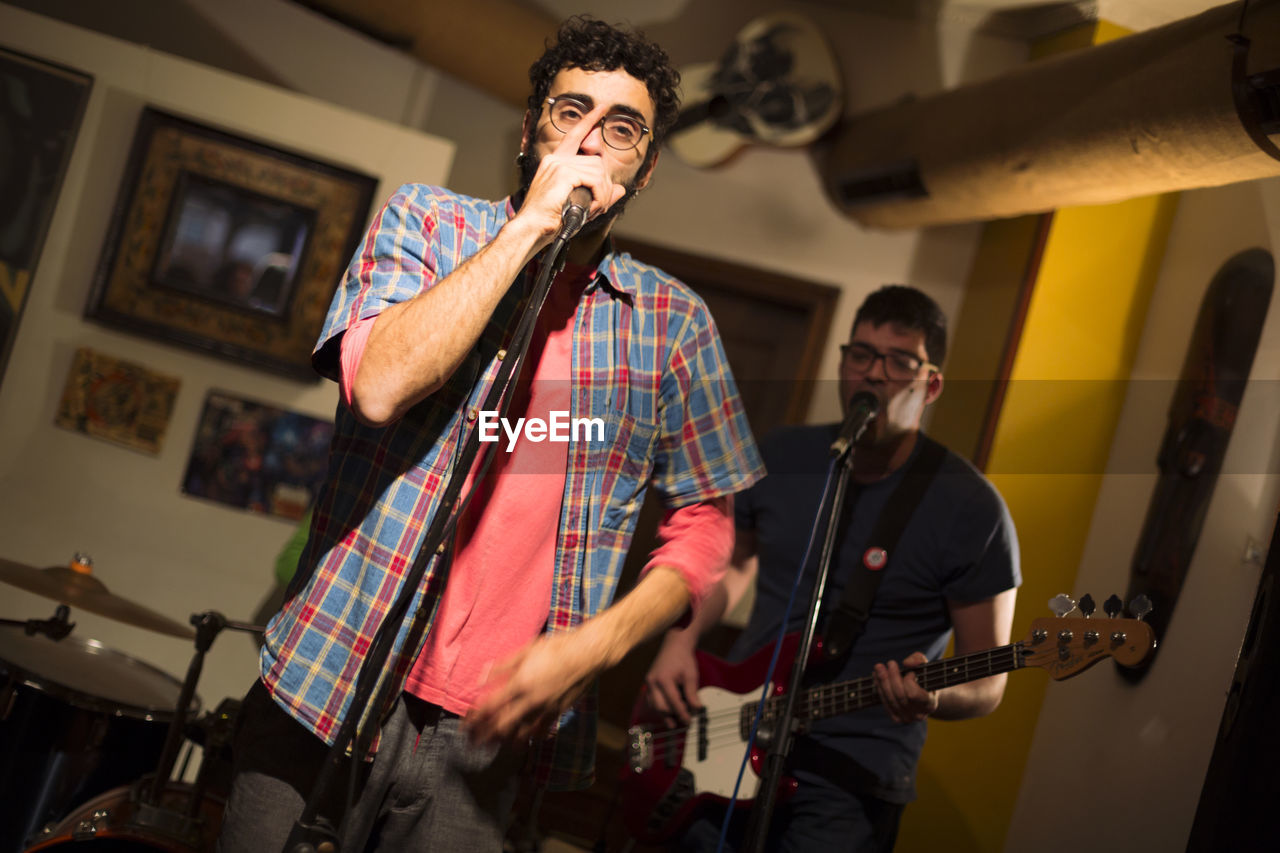 Man singing in studio