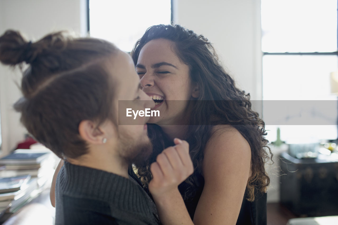 A young couple embracing