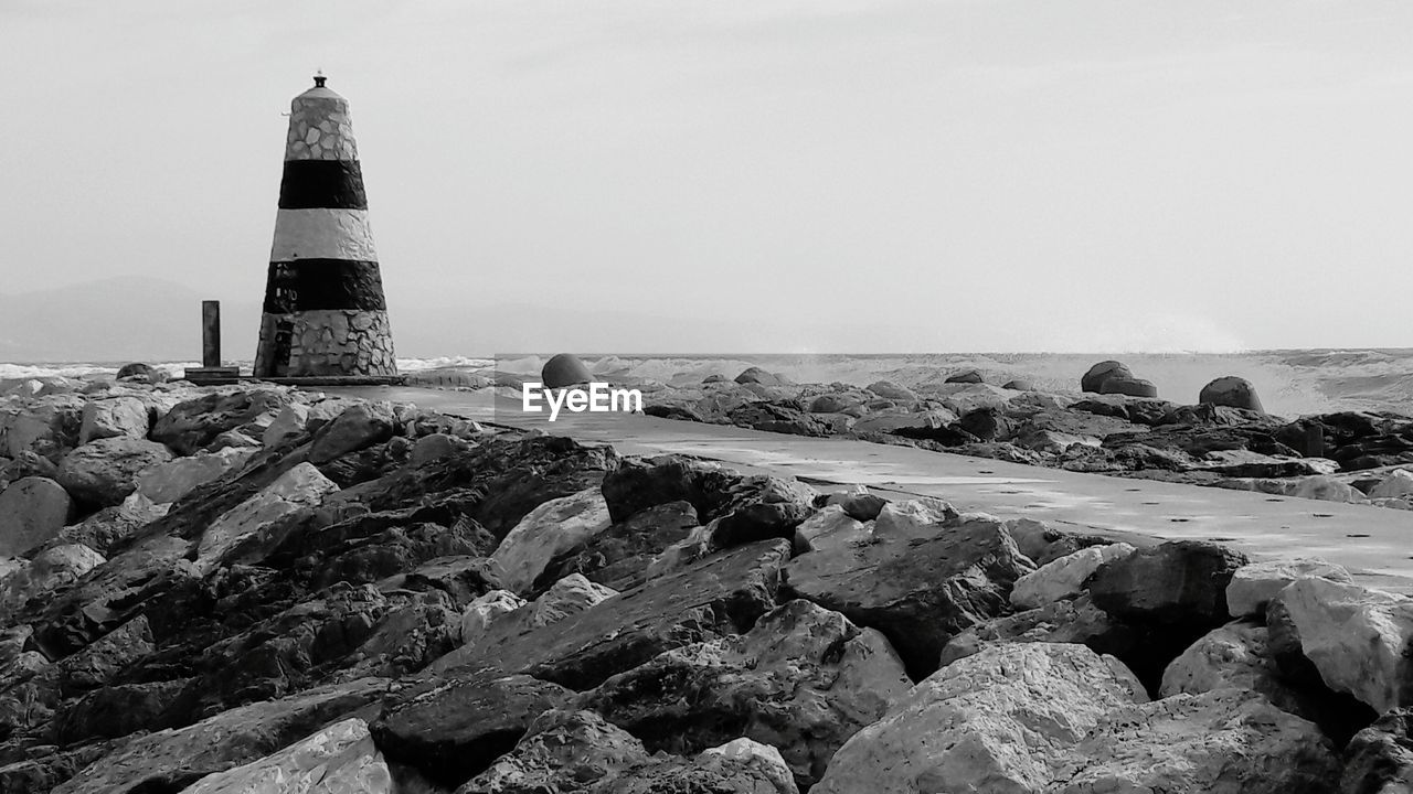 LIGHTHOUSE ON COAST