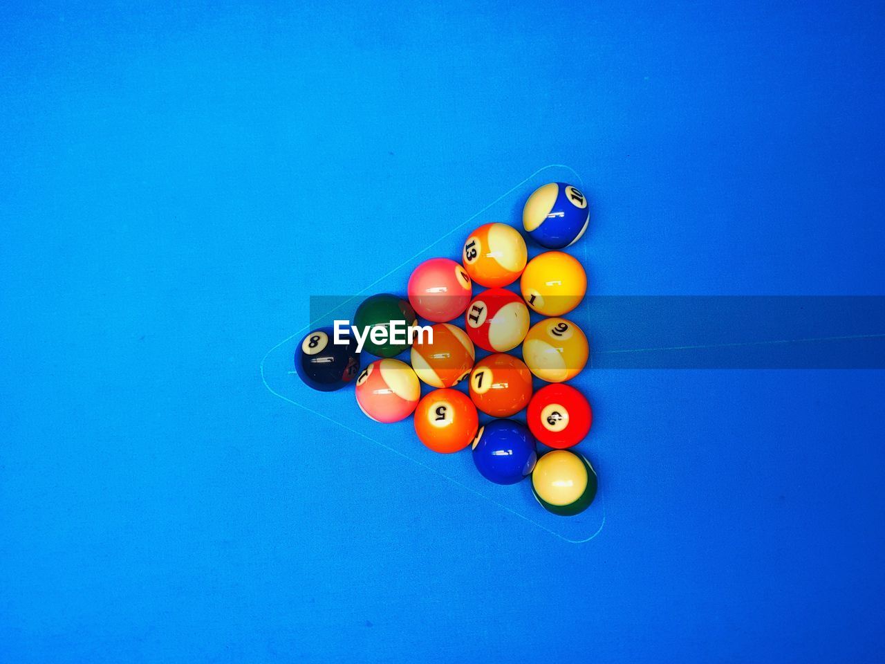 Directly above view of colorful balls on pool table