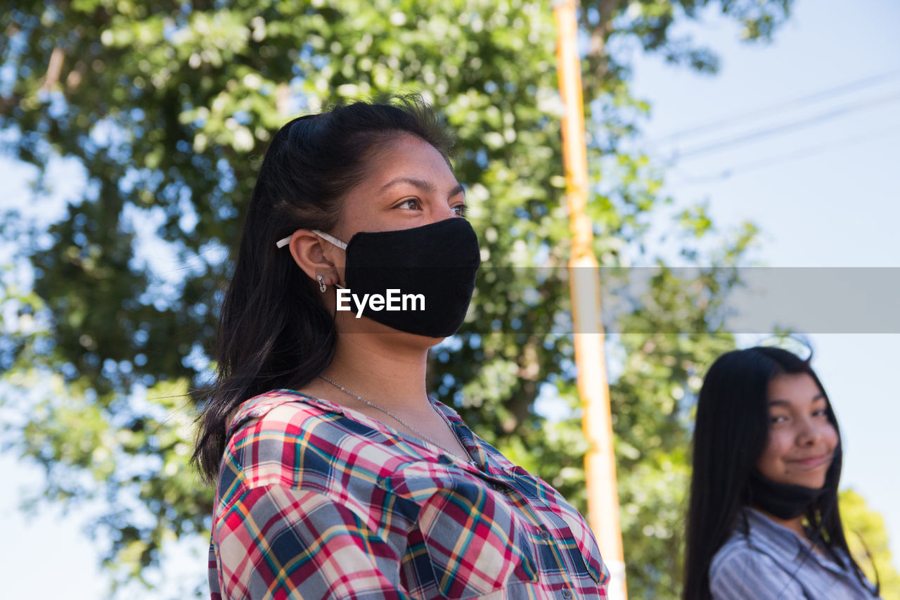 Young women wearing face mask