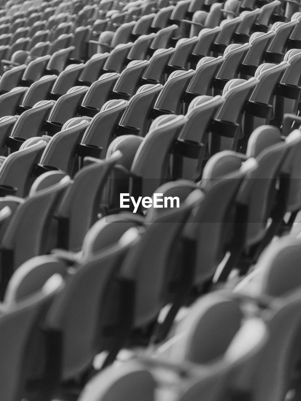 full frame shot of empty chairs arranged