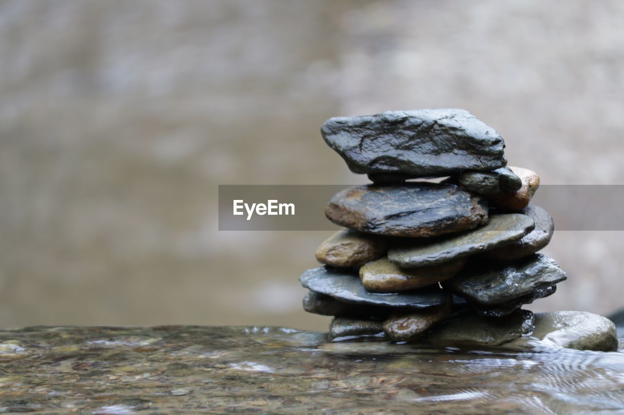 balance, rock, zen-like, close-up, nature, stone, no people, water, wood, focus on foreground, stability, day, macro photography, outdoors, land, pebble, tranquility