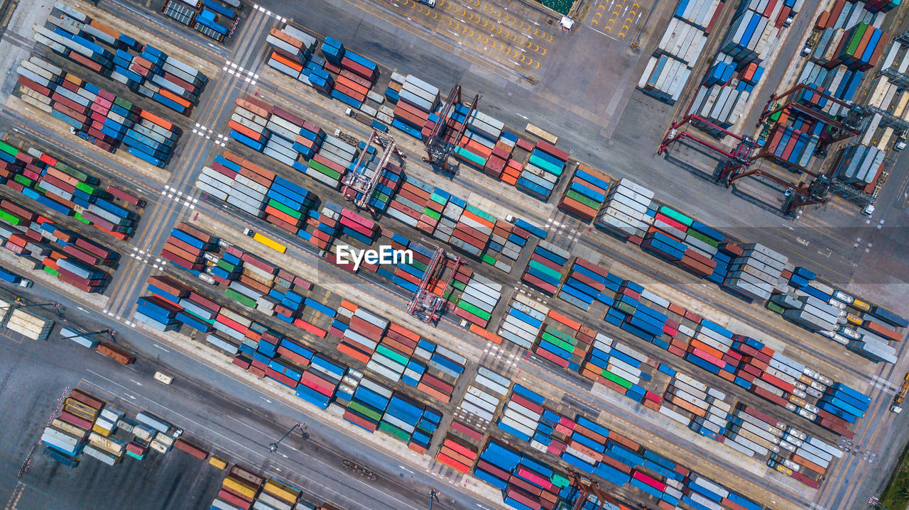 High angle view of container ship at commercial dock