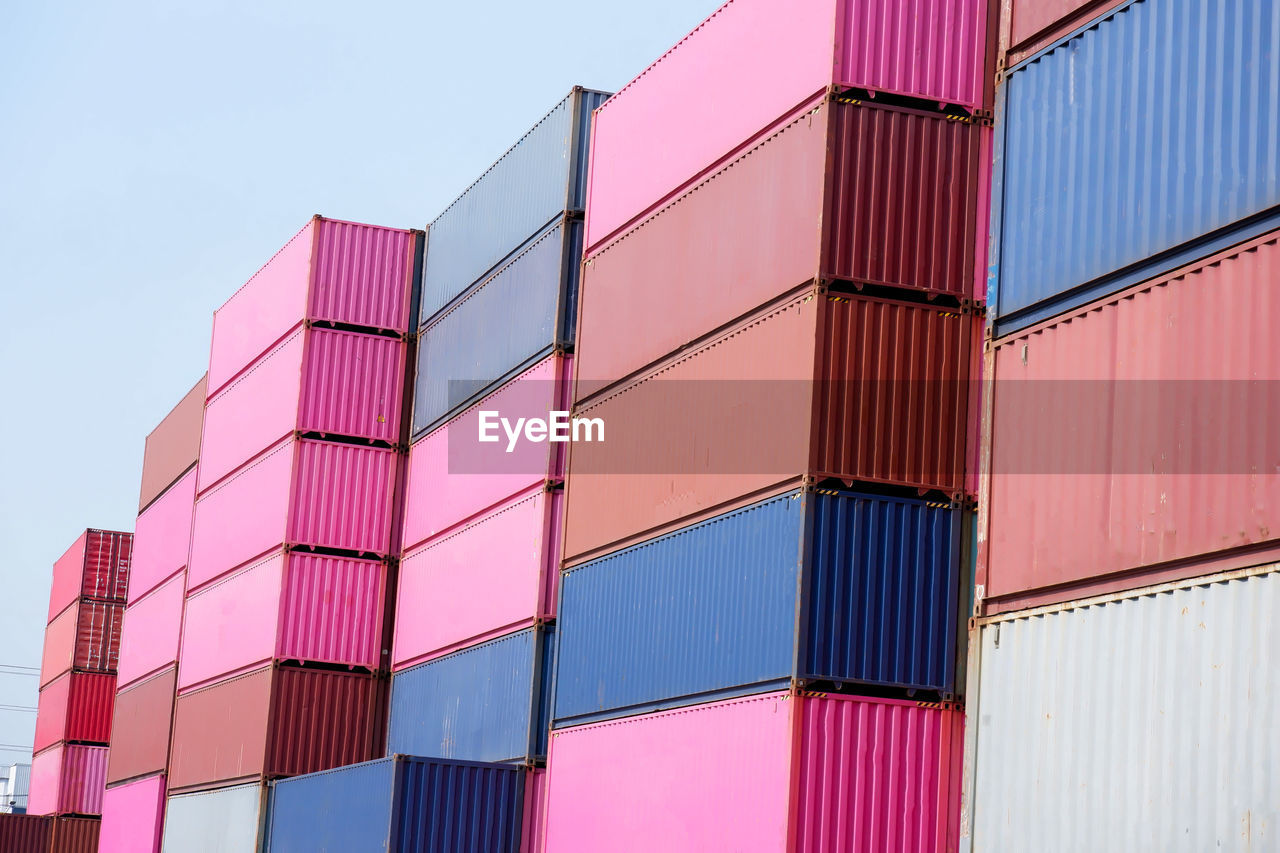 low angle view of multi colored buildings against sky