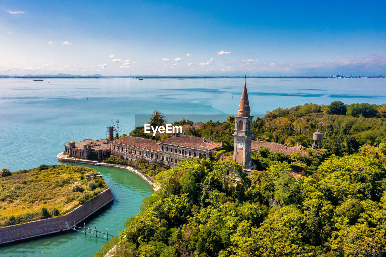 Aerial view of the plagued ghost island of poveglia in venice