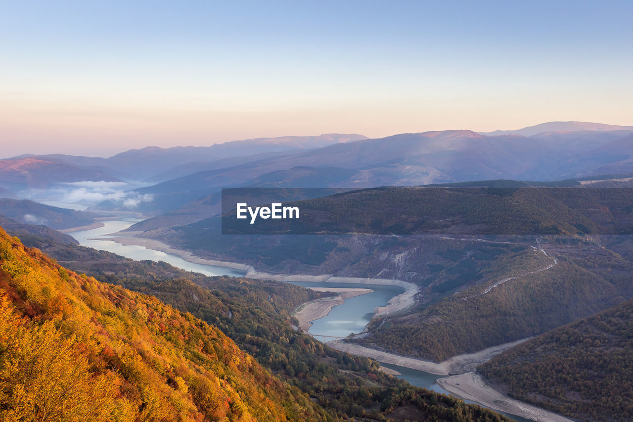 High angle view of mountains against clear sky