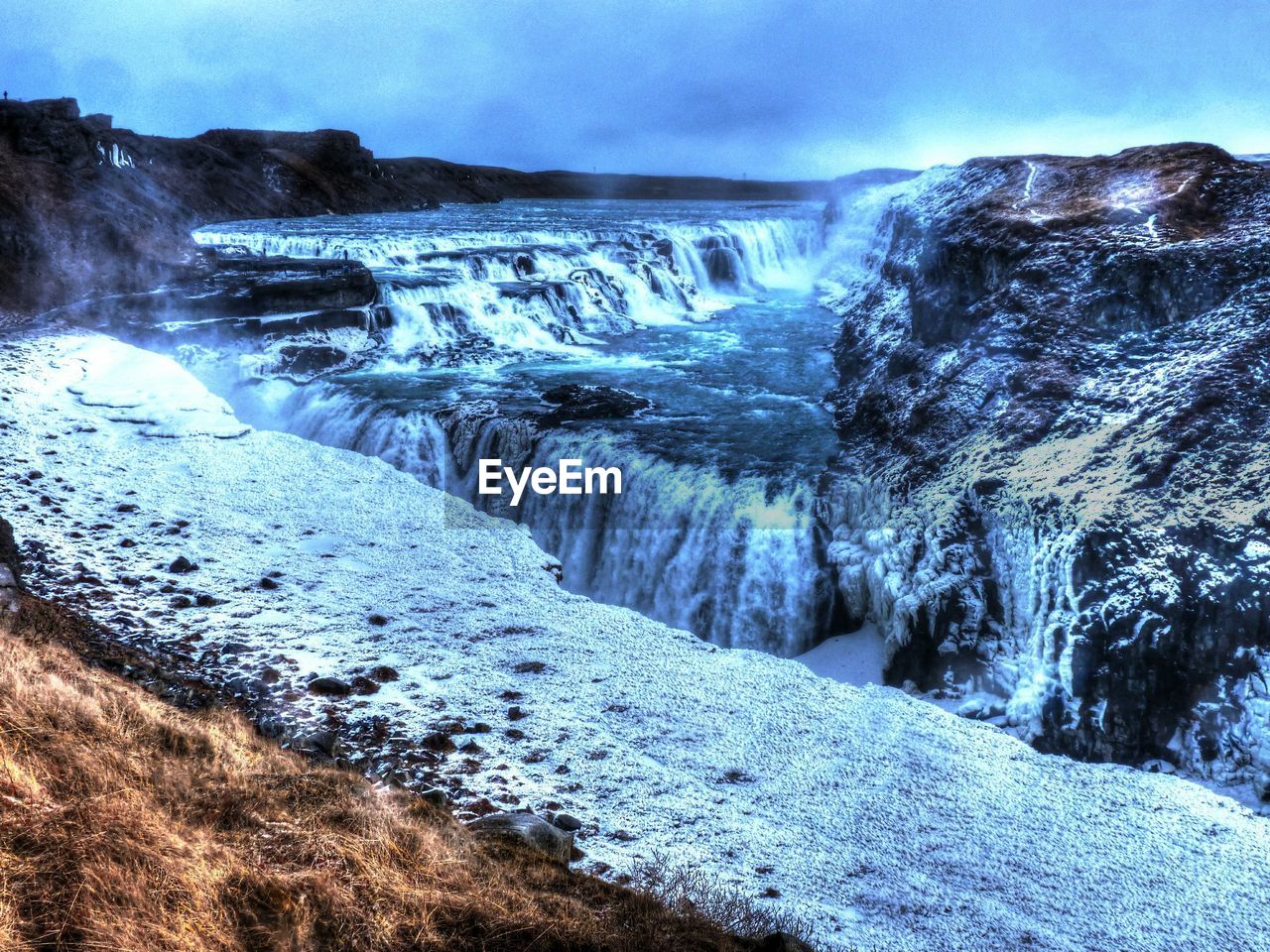 SCENIC VIEW OF WATERFALL