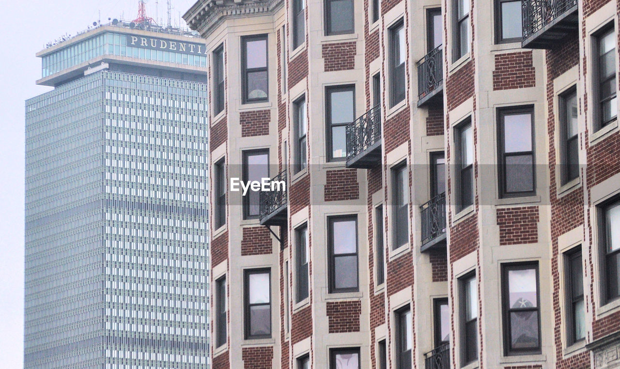 LOW ANGLE VIEW OF RESIDENTIAL BUILDING