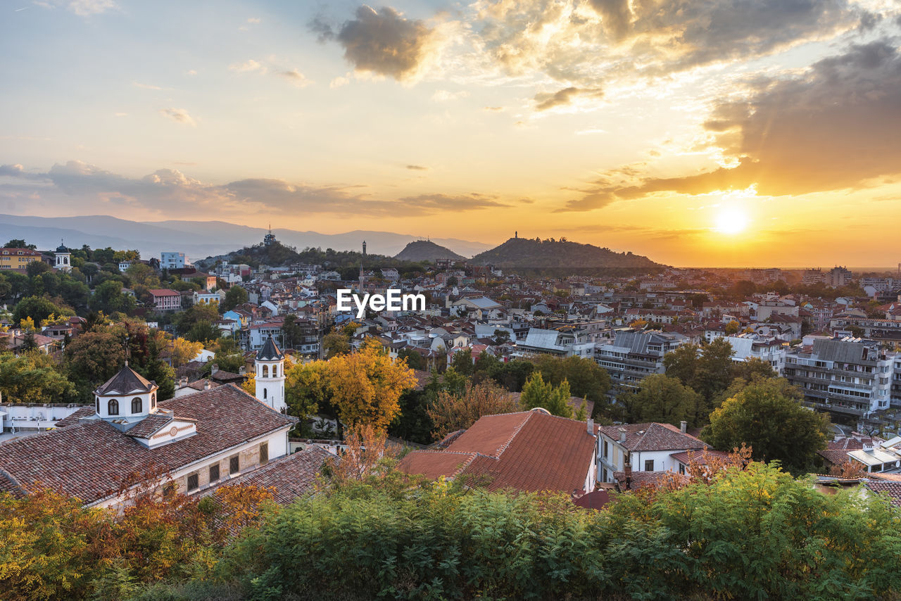 High angle view of townscape against sky at sunset