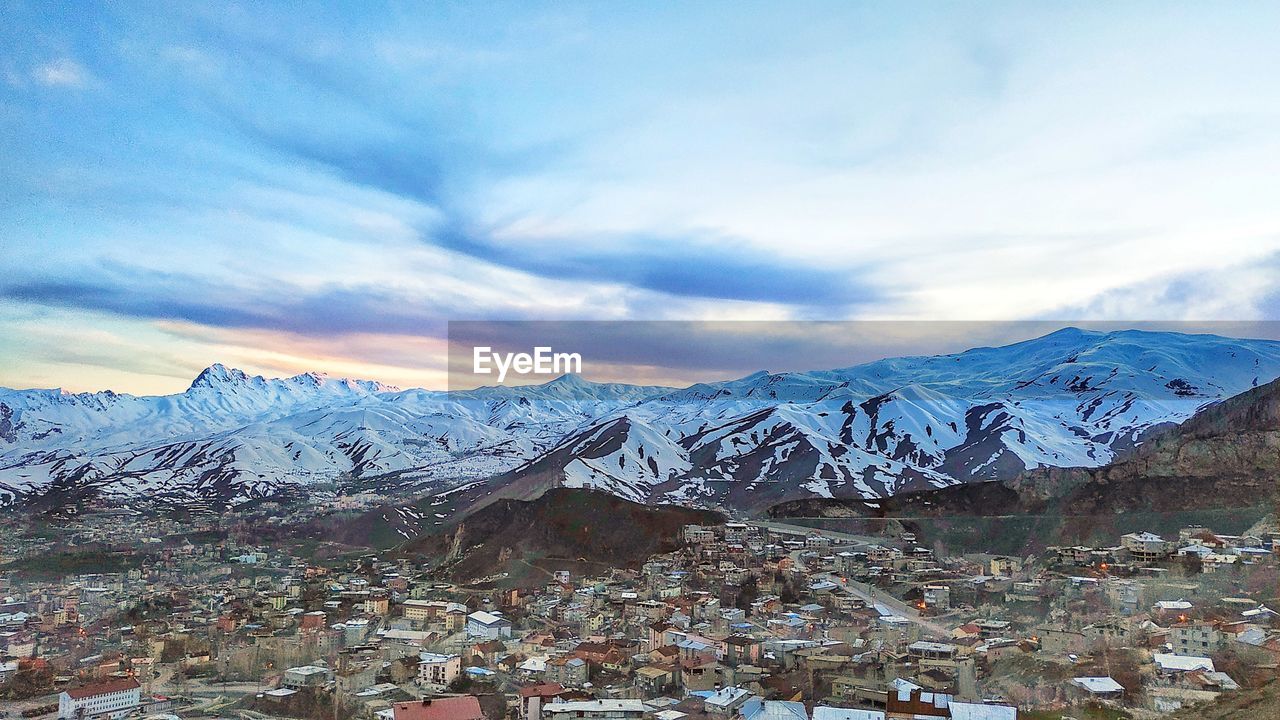 SNOWCAPPED MOUNTAINS AGAINST SKY