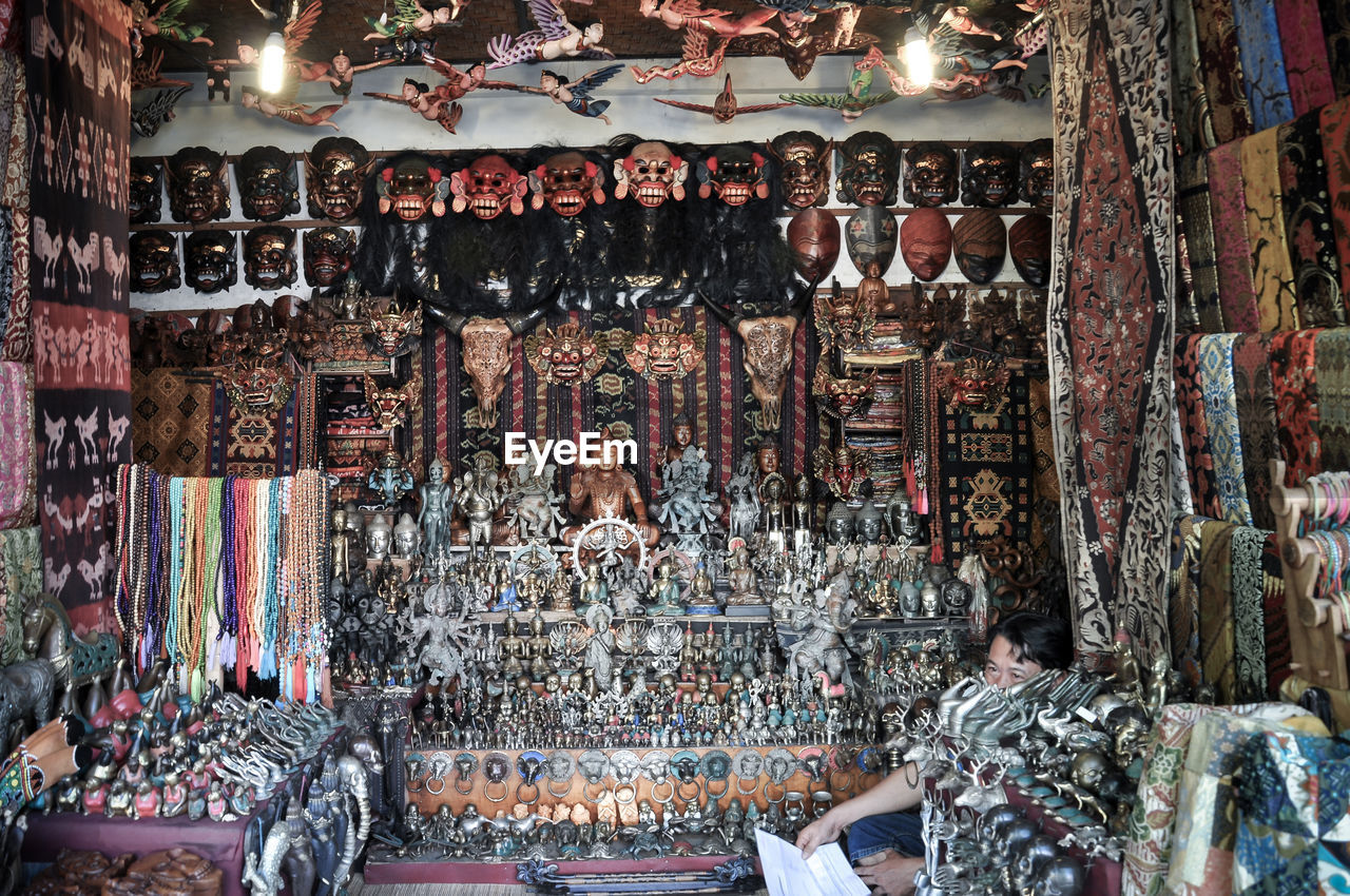 Statues and masks in store for sale