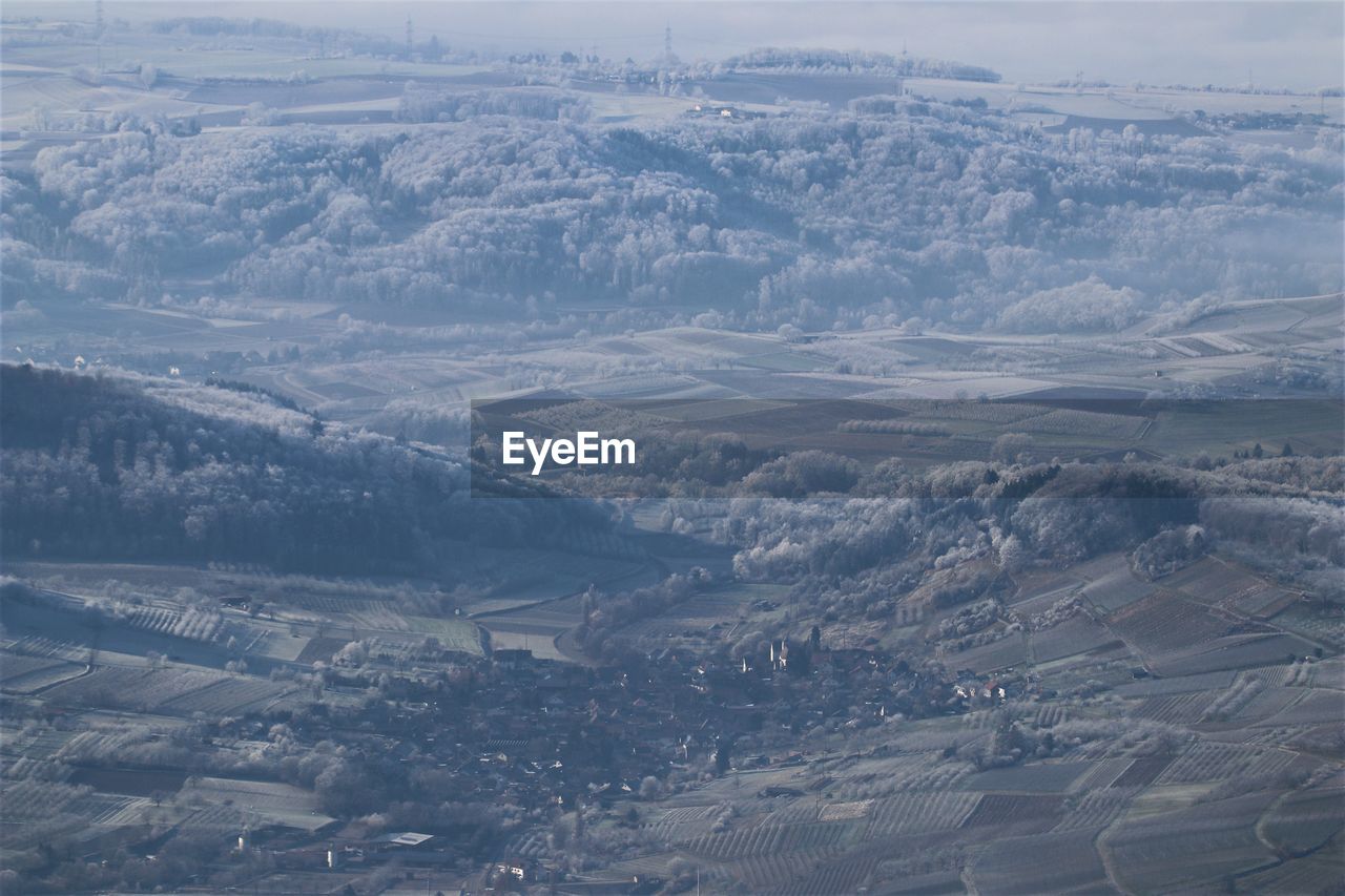 aerial view of cityscape against sky