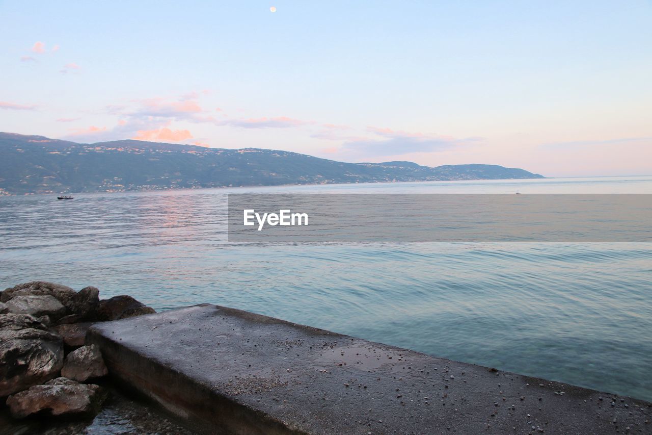 SCENIC VIEW OF SEA DURING SUNSET