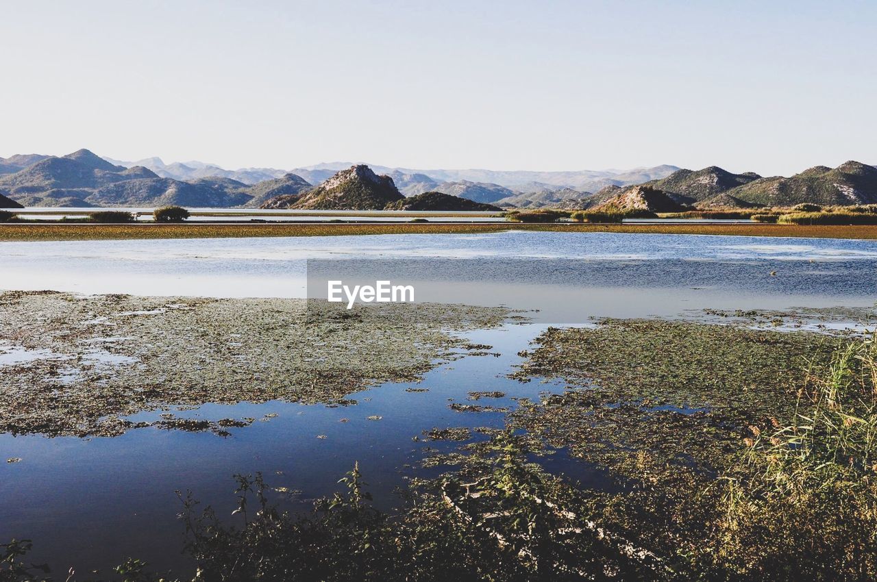 Scenic view of lake against sky