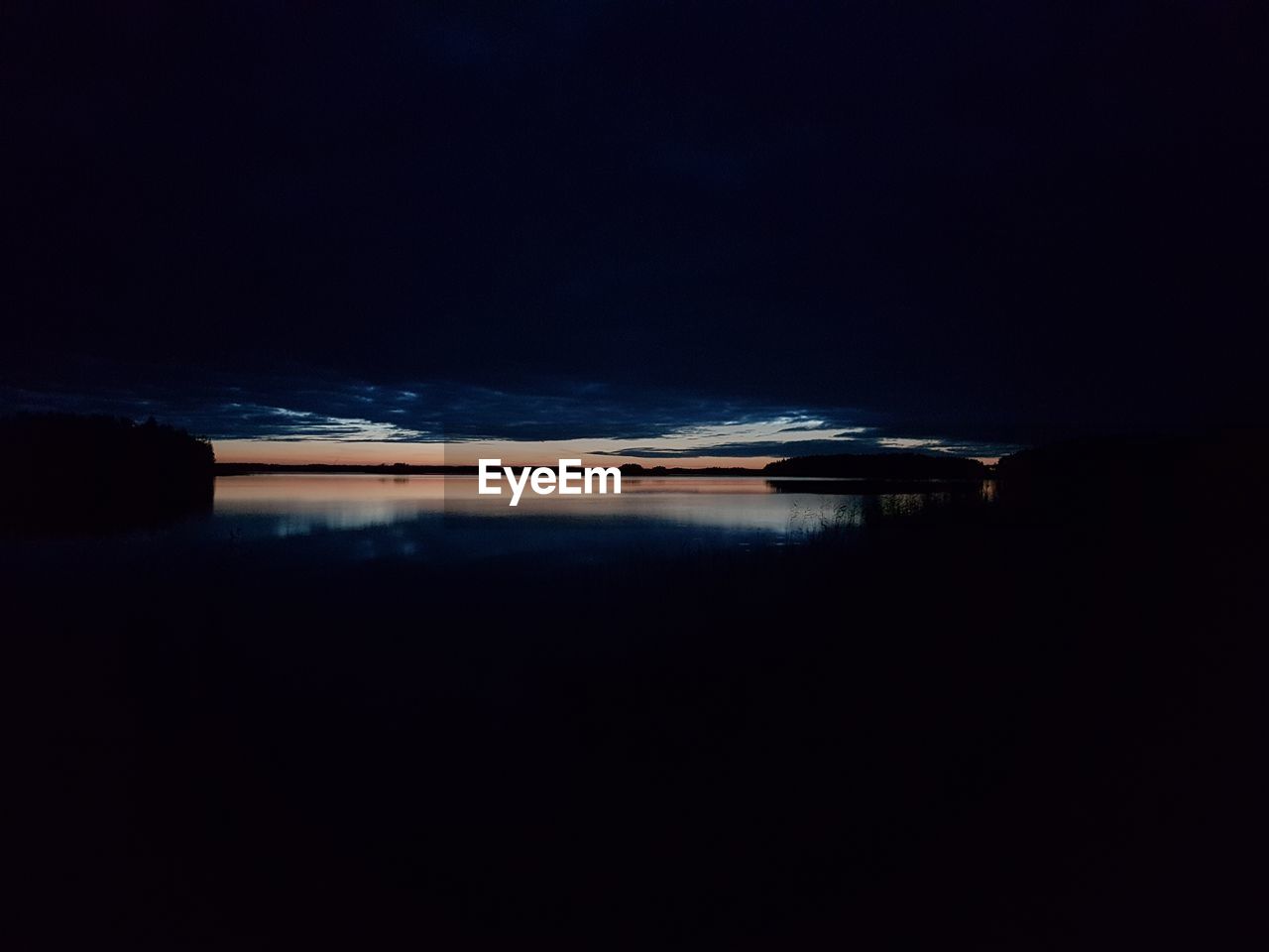 VIEW OF SEA AGAINST SKY AT SUNSET