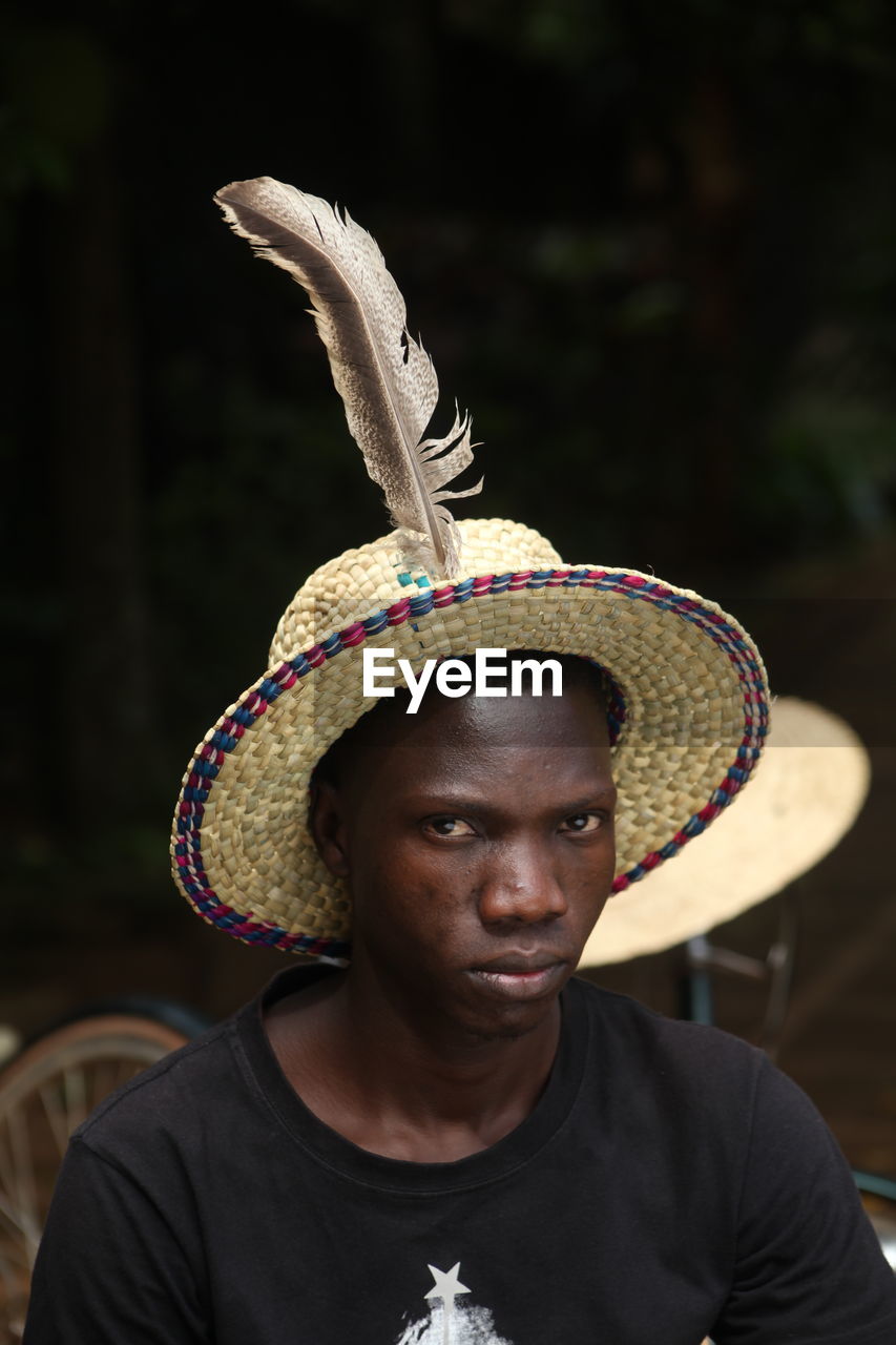 Portrait of man wearing hat