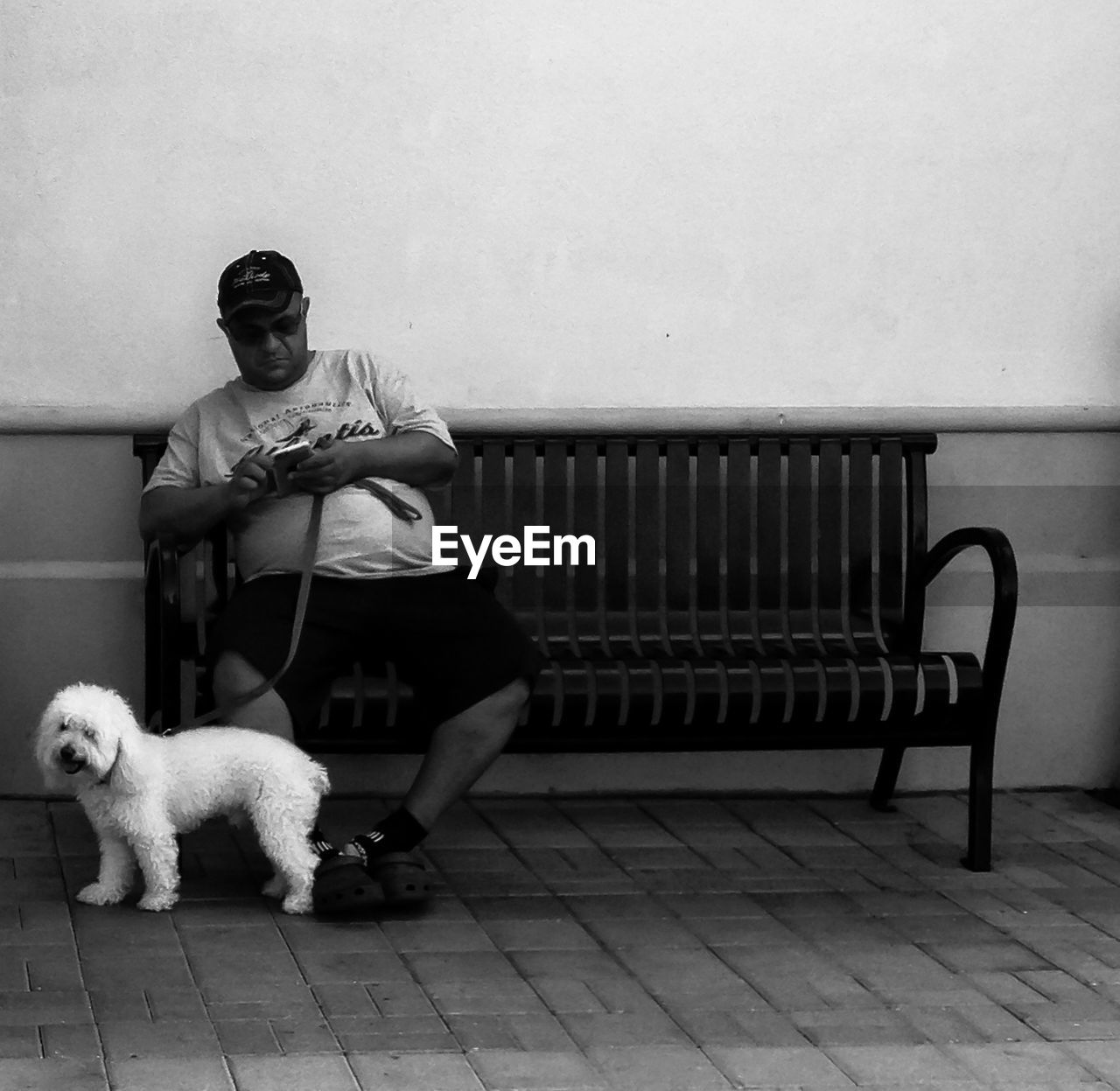 WOMAN SITTING ON BENCH