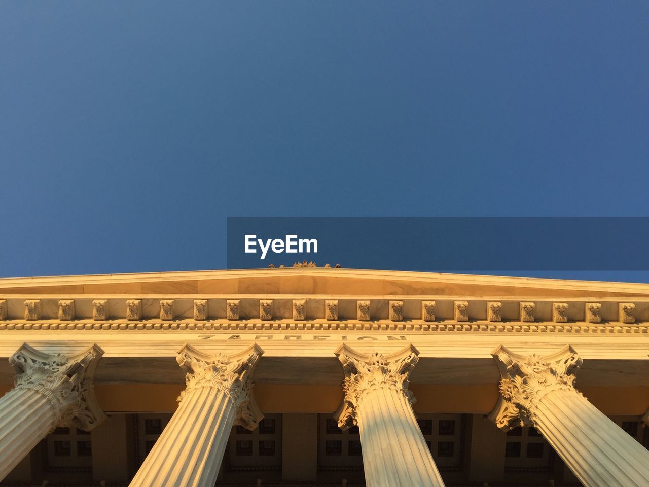 Low angle view of zappeion against clear sky