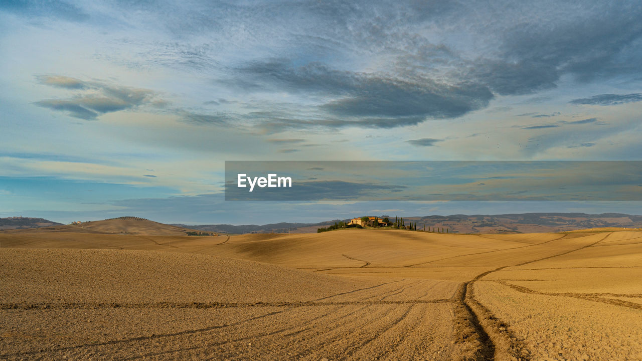 Scenic view of desert against sky