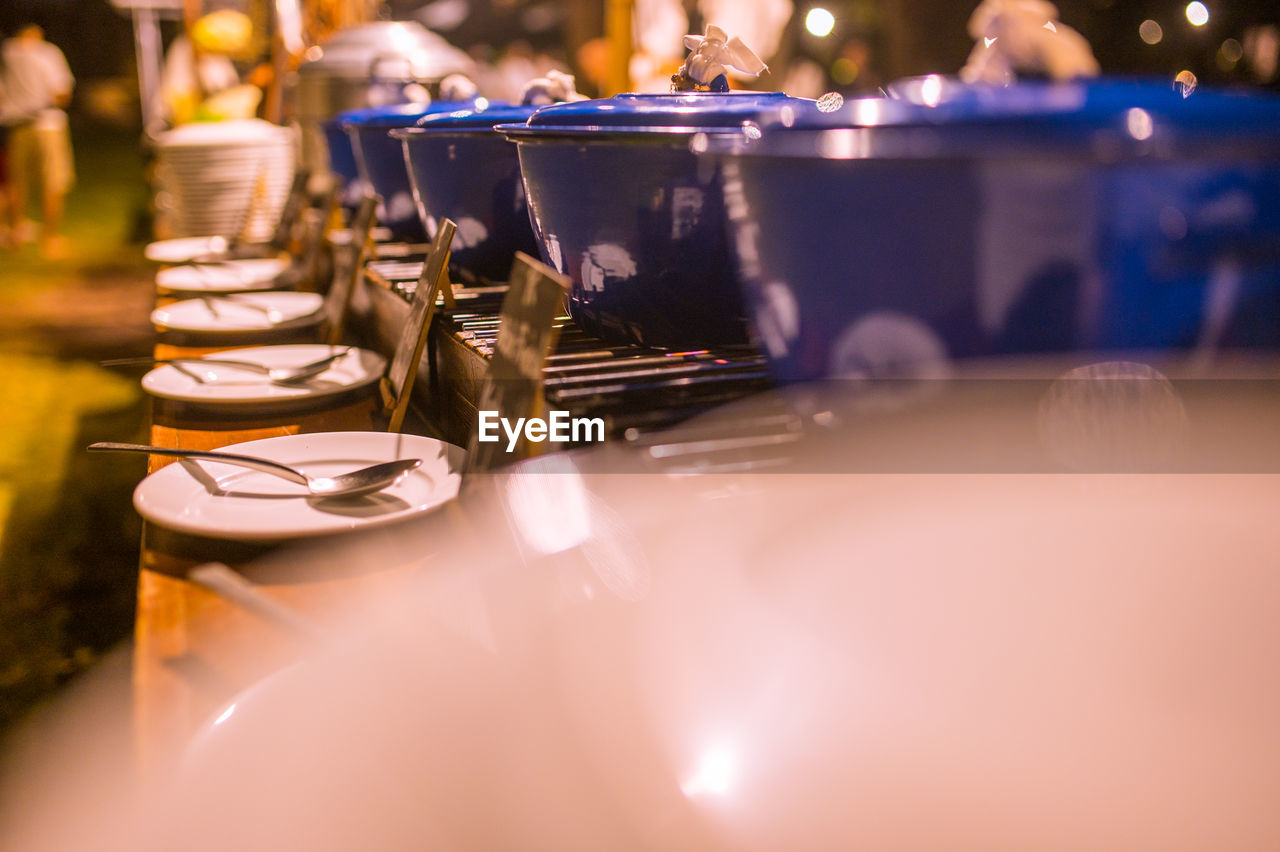 CLOSE-UP OF GLASS OF WINE GLASSES ON TABLE