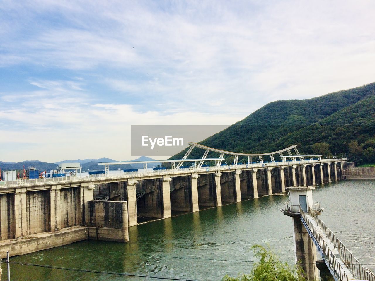 Bridge over river against sky