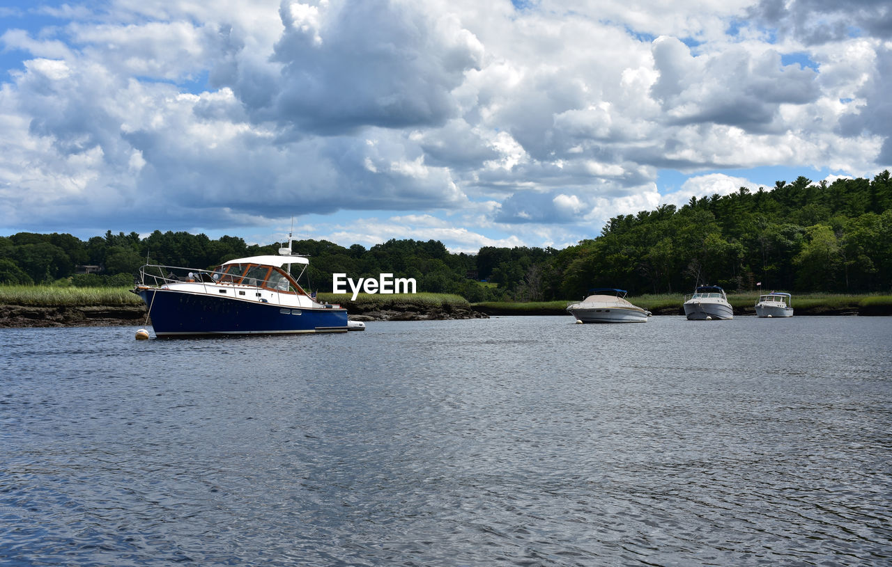 View of boats achored along north river in massachusetts.