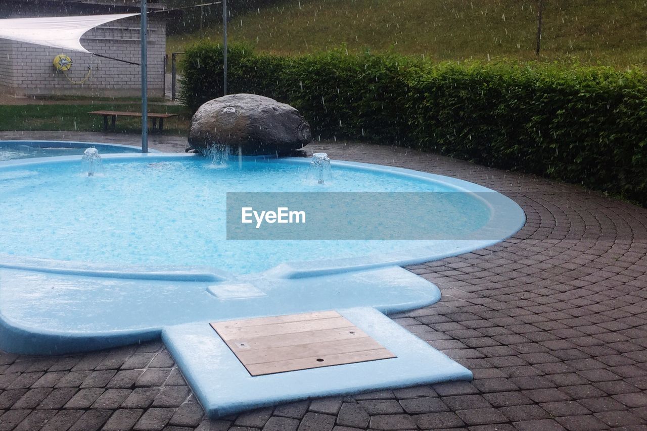 SWIMMING POOL IN WATER