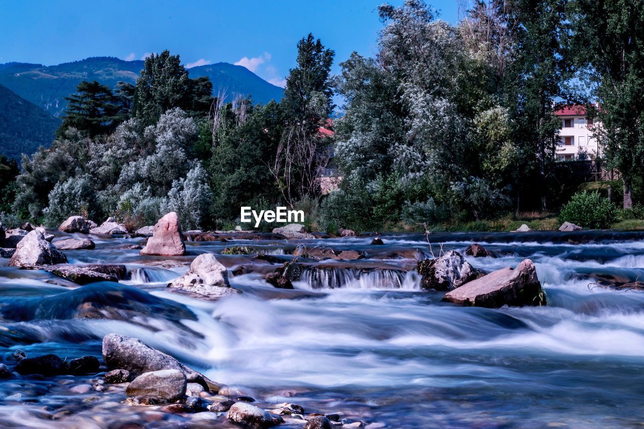 Scenic view of river against sky