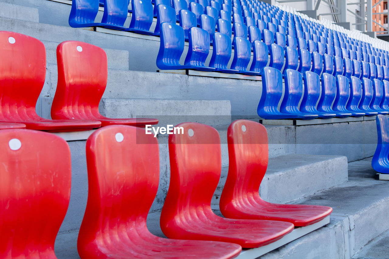 Red and blue seats in the stadium.