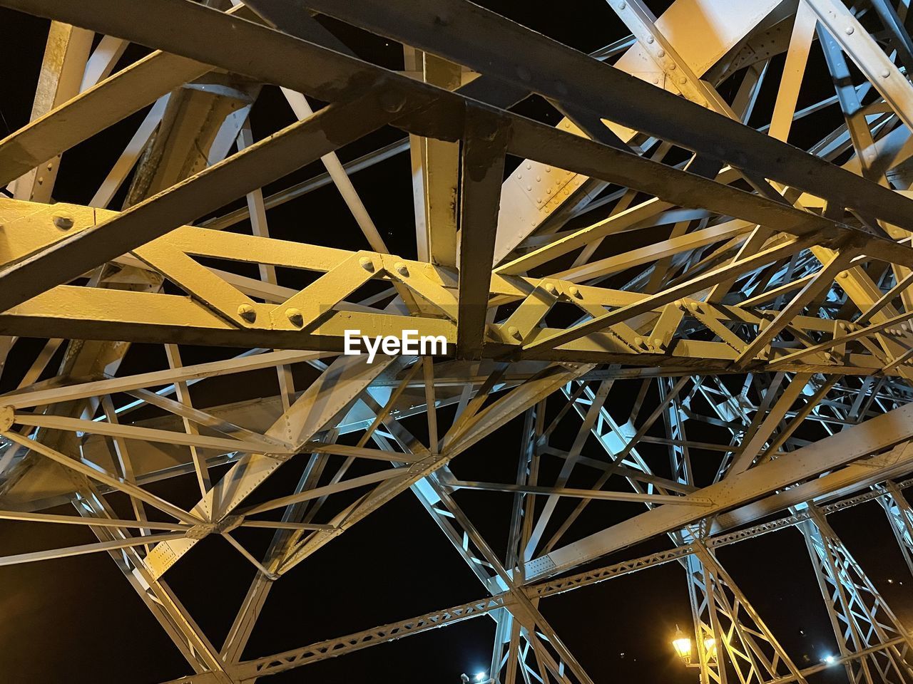 LOW ANGLE VIEW OF METALLIC STRUCTURE