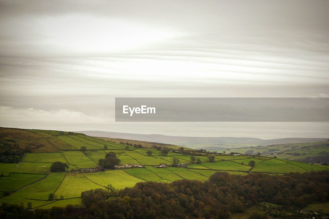 AGRICULTURAL FIELD AGAINST SKY