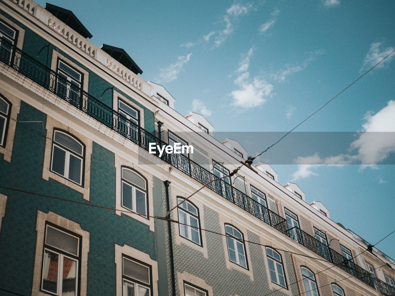 Low angle view of residential building against sky