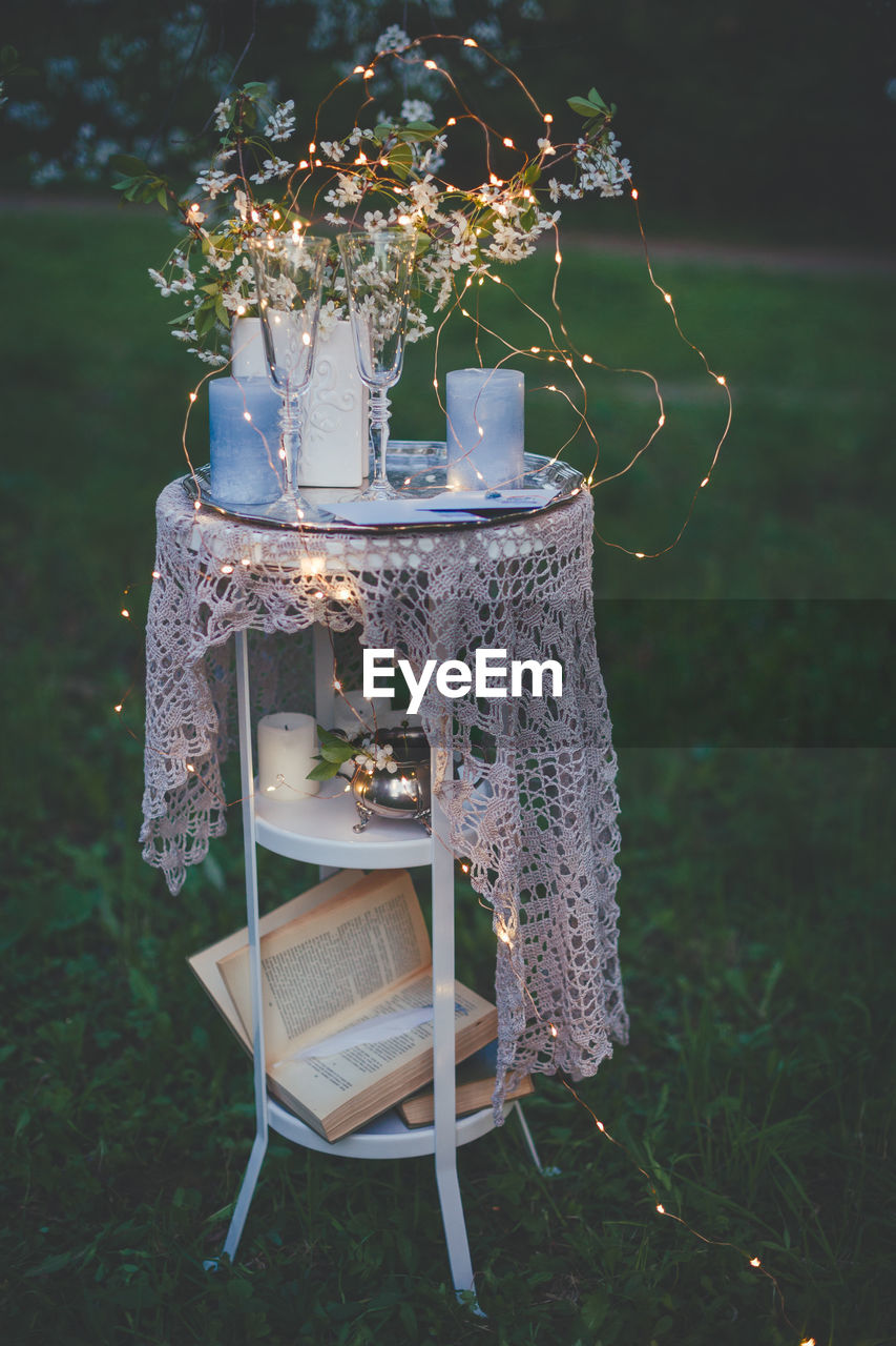 Empty coffee cup on table with book