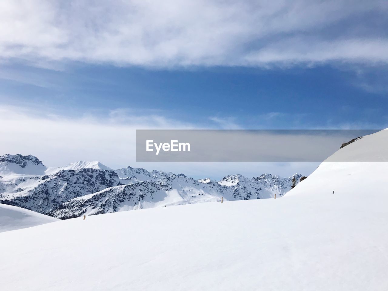 Snow covered mountains against sky