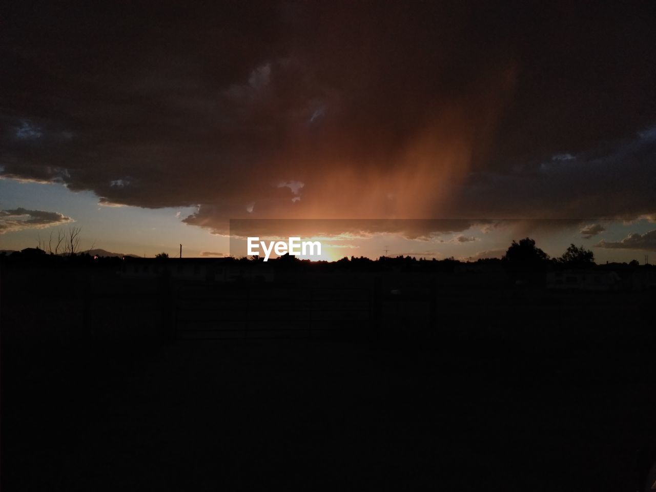 SCENIC VIEW OF DRAMATIC SKY DURING SUNSET