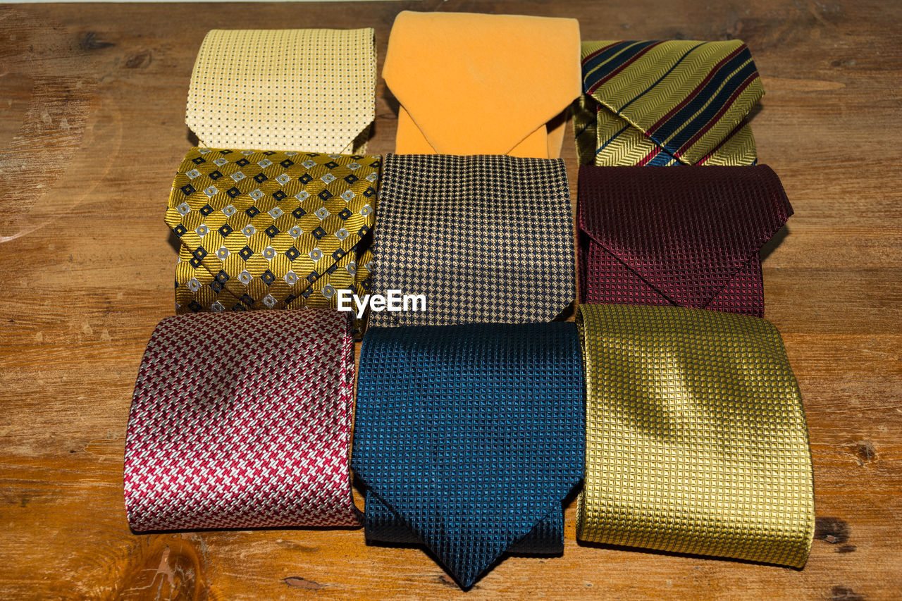 High angle view of multi colored neckties on table