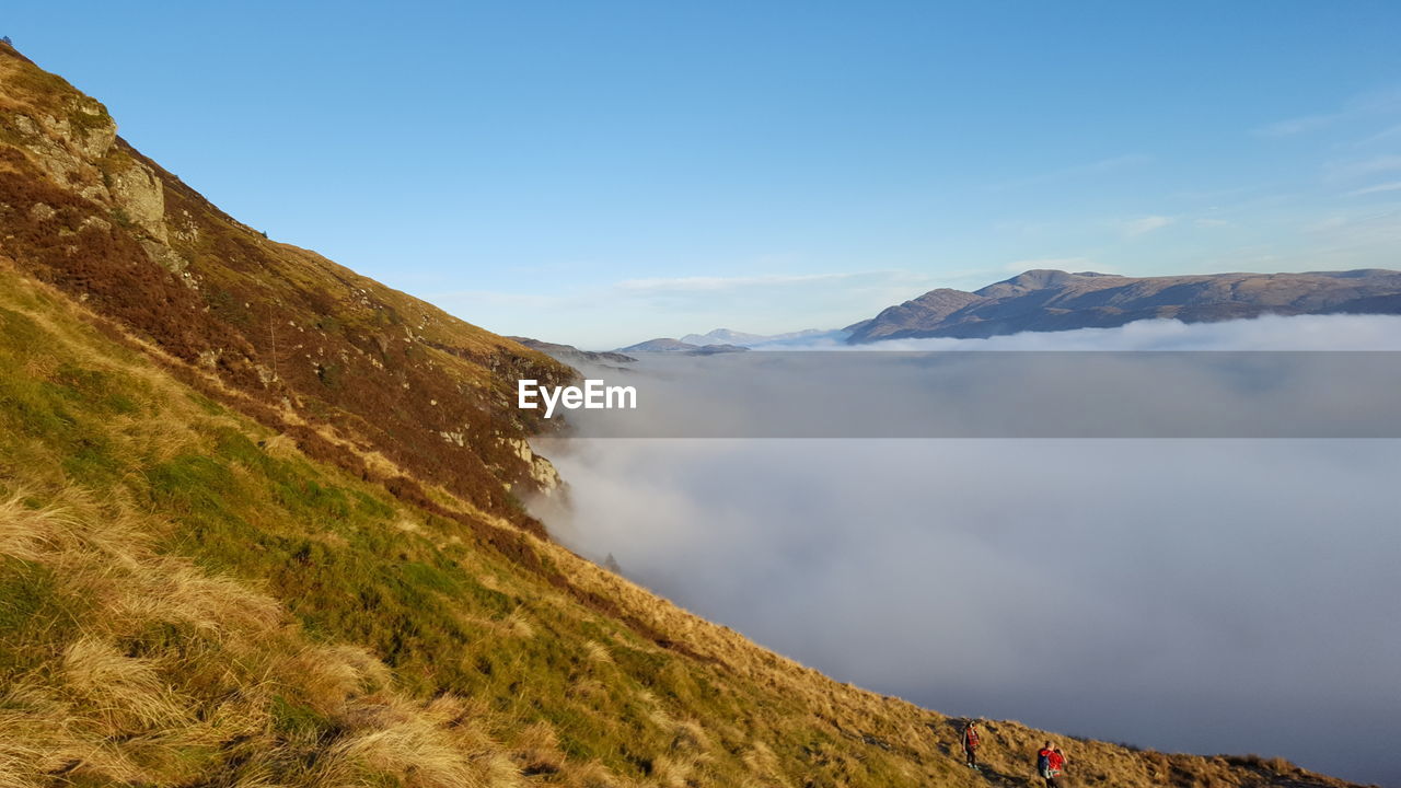 Scenic view of mountains against sky during winter