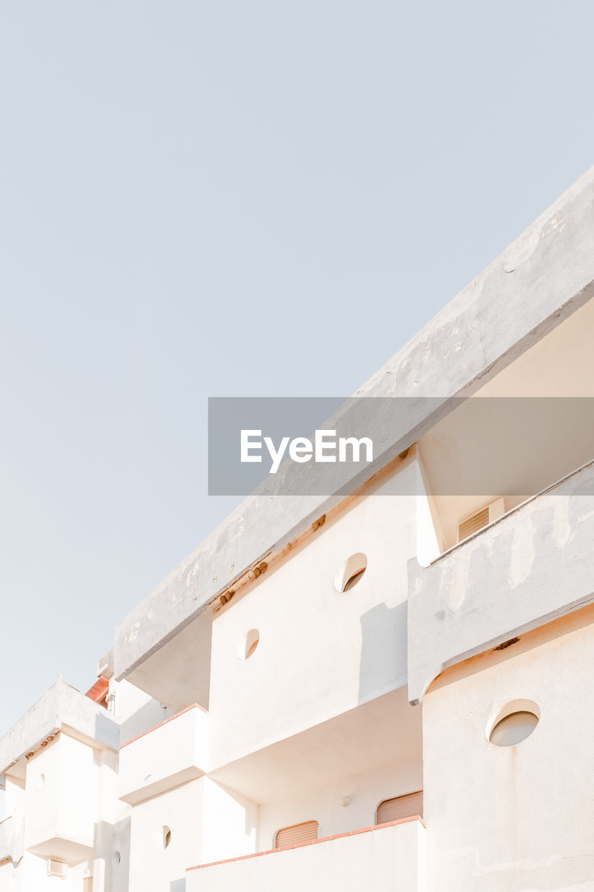 Low angle view of building against clear sky