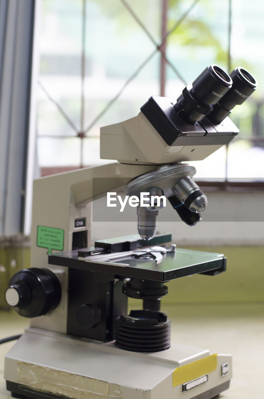 Close-up of microscope and equipment