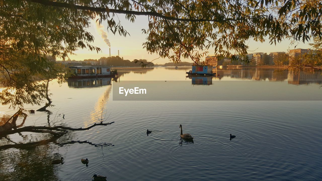 BOATS IN CALM LAKE