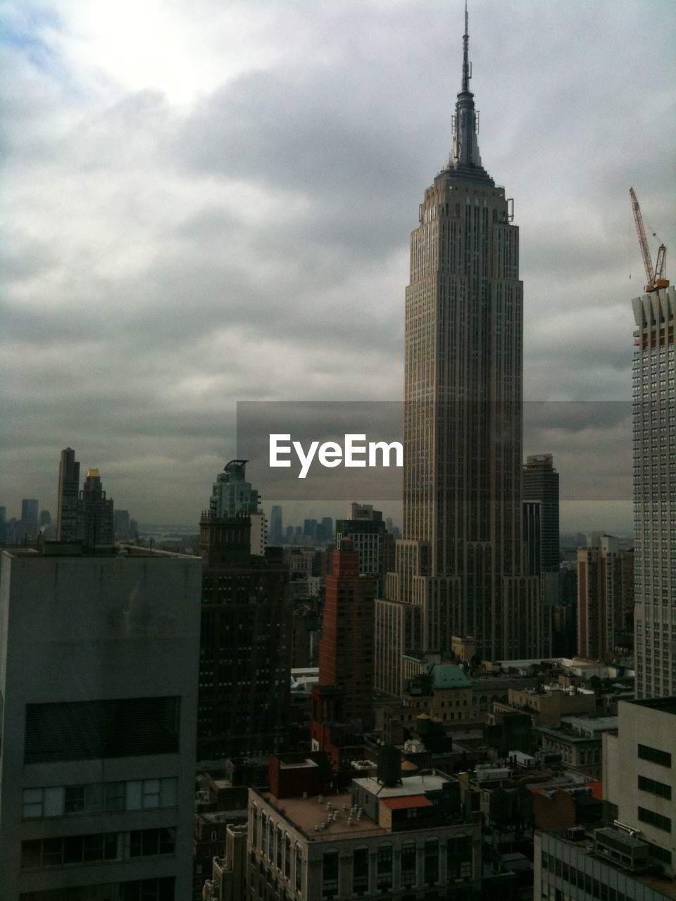 Cityscape against clouds